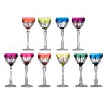 A collection of ten crystal cut Val-Saint-Lambert wine glasses, with various colours of overlay deco