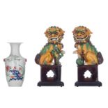 A fine pair of Chinese sancai biscuit figures of Buddhist lions - added a Chinese famille rose vase,