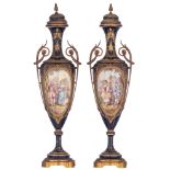 A pair of covered bleu royale ground SŠvres vases with Neoclassical gilt bronze mounts, the roundels
