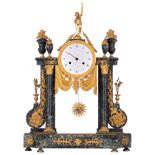 A Louis XVI vert de mer marble pendulum mantle clock, decorated with ormolu bronze mounts of palmett