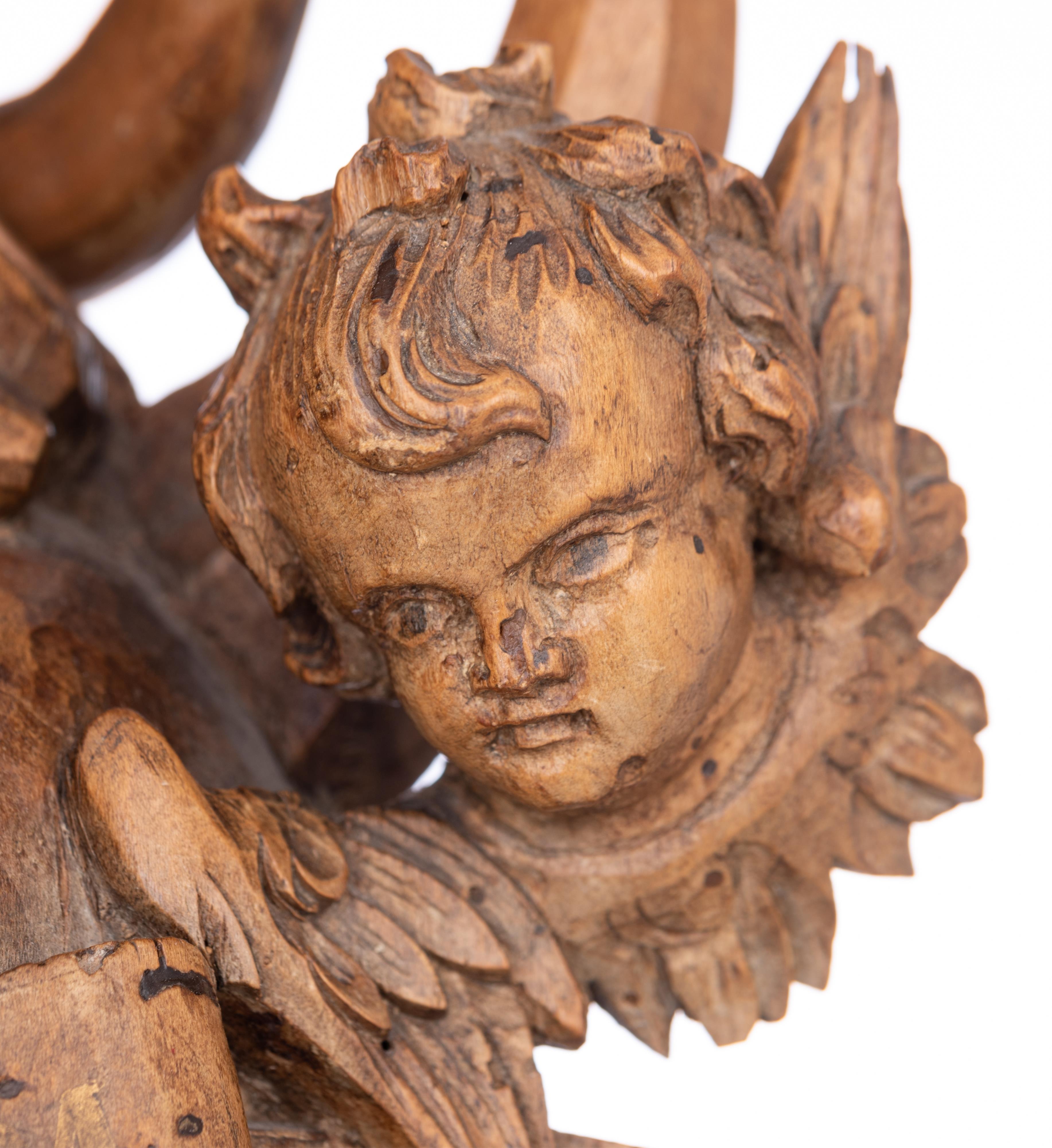 A walnut sculpture of the Madonna holding the Holy Child and standing on the crescent moon destroyin - Image 15 of 19