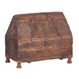 A Middle Eastern walnut bridal chest, decorated with carved geometric motifs, H 36 - W 42,5 - D 24 c