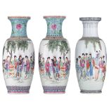 A pair of Chinese Republic period famille rose vases and a ditto vase, all vases decorated with beau