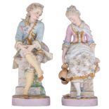 A pair of French polychrome and gilt decorated biscuit figurines, depicting a young couple in love,