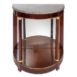 A fine mahogany veneered Empire demi-lune console table, with gilt brass mounts and a mirror back, o