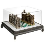 Canestraro L., chessboard, patinated bronze pieces on a Carrara marble and green vulcanic stone boar