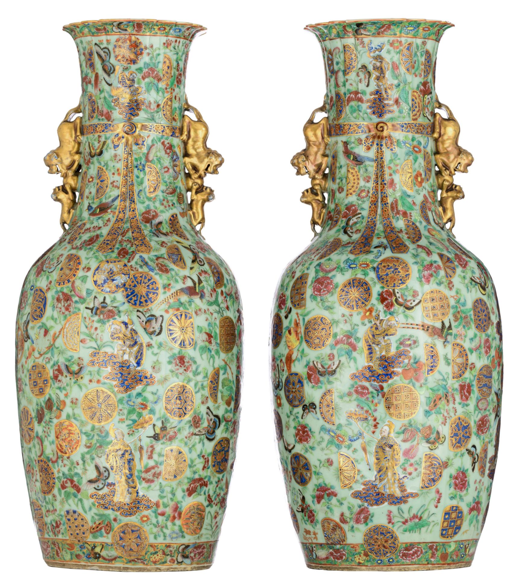 A pair of Chinese Canton famille rose on celadon ground vases, all over decorated with the Eight Imm