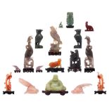 Seventeen various carved quartz figures, 20thC, tallest figure H 21,5 cm