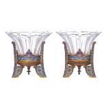 A pair of French Art Nouveau bronze champlevé tripod stands with crystal cut coupes, H 19,5 cm