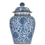 A Chinese blue and white 'Peony' jar and cover, 17thC, H 53 cm
