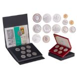 A various collection of gold and silver medals and coins