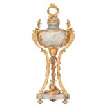 A Neoclassical onyx tripod cassolette with very fine gilt bronze mounts, H 36,5 cm