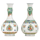 A pair of famille verte bottle vases, Kangxi period, H 20 cm