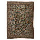 An Oriental Ghoum rug, decorated with floral scrollworks, 235 x 330 cm
