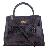 HERMÈS, Kelly Sellier 29 bag, Brown crocodile leather, with gilt metal hardware, Vintage about 1975