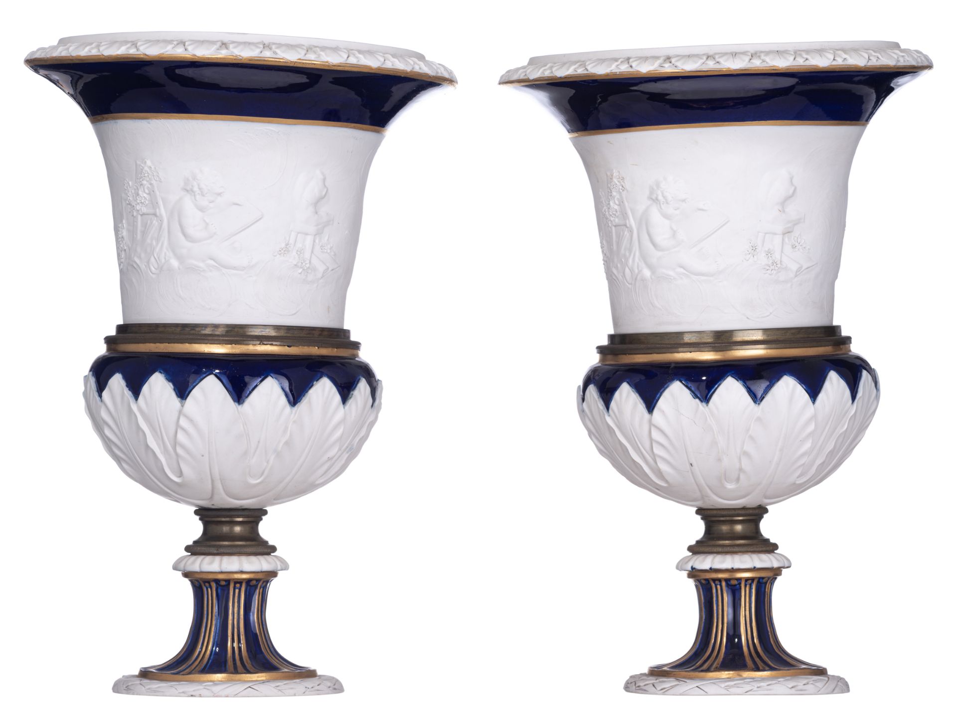 A fine pair of biscuit Medici vases, decorated with an allegory of painting, H 39 cm