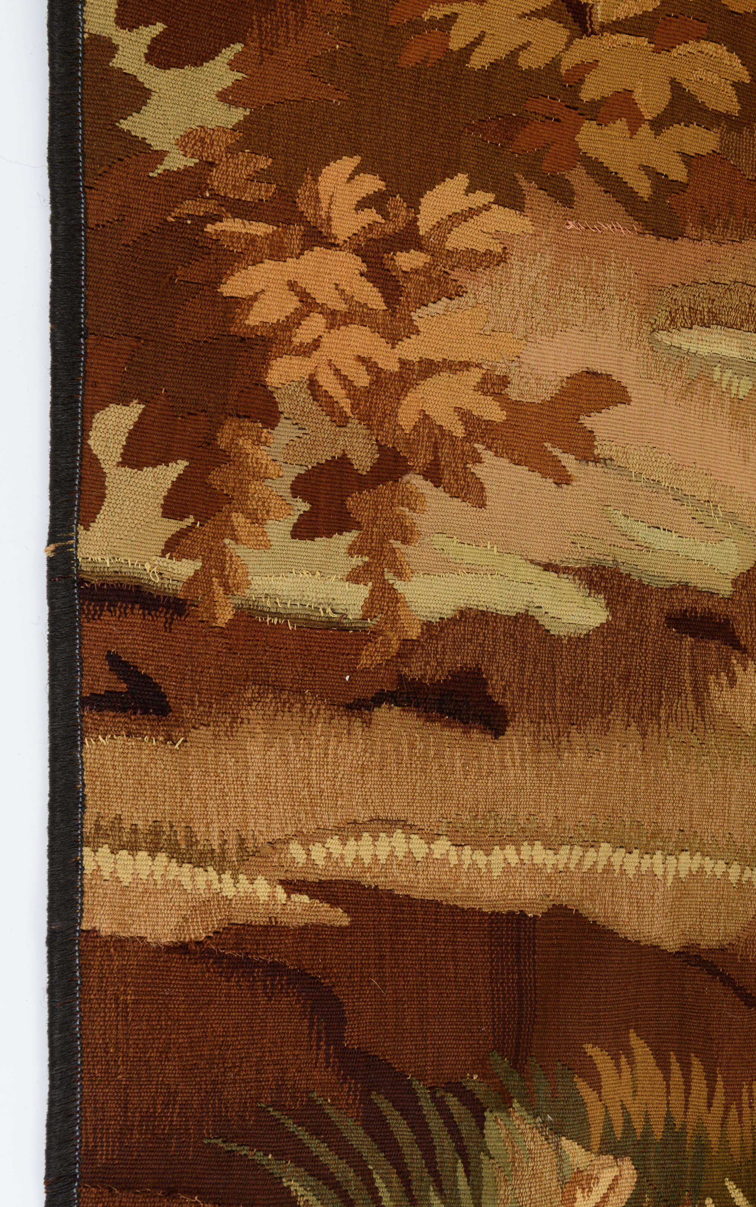 An Aubusson type tapestry, decorated with a lumberjack scene, 19thC, 125 x 405 cm - Image 5 of 7