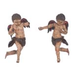 A pair of carved and polychrome painted angels, H 24 - 25 cm