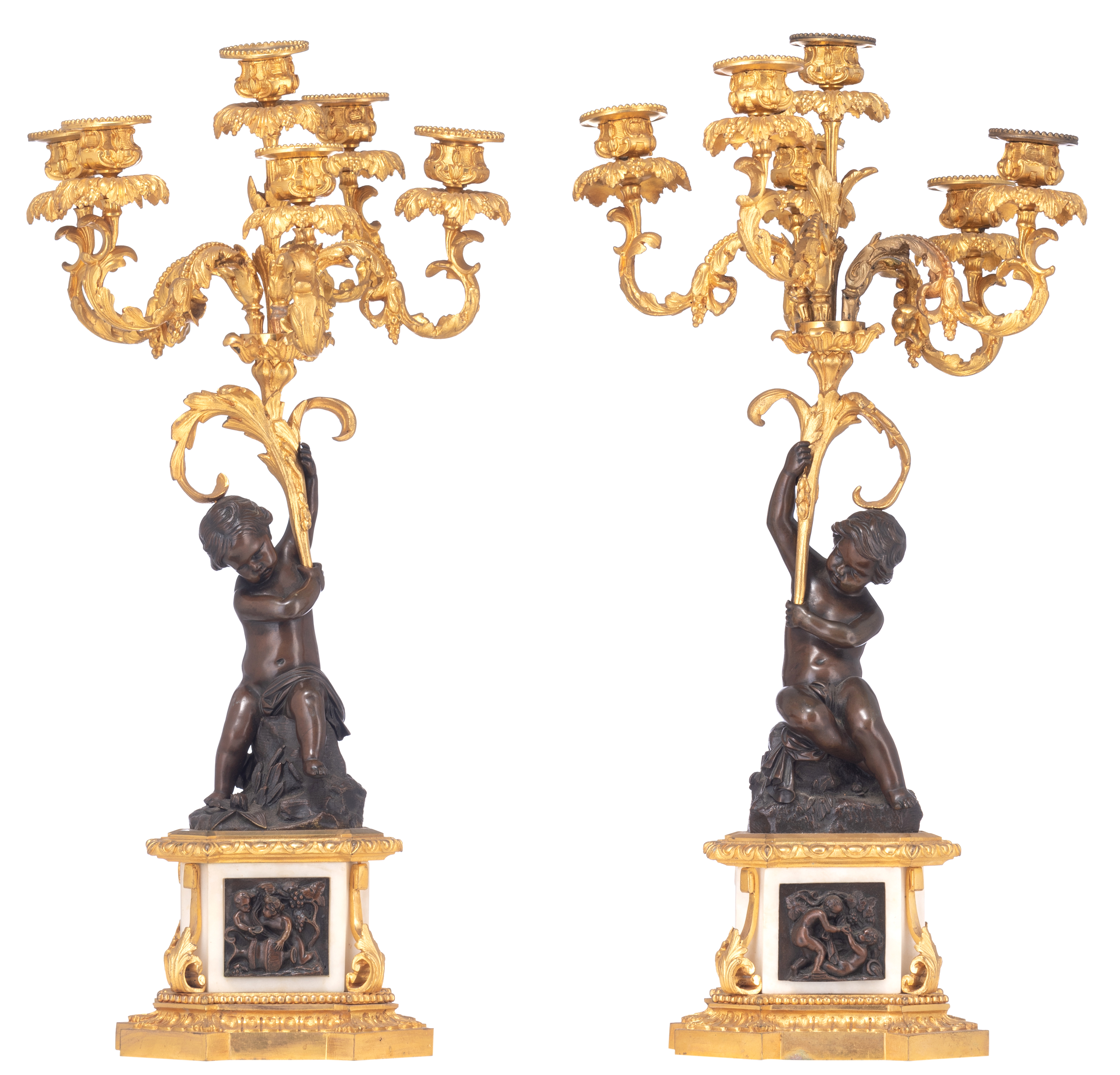 A fine pair of Neoclassical candelabras, decorated with putti, H 63,5