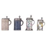 A collection of four German pewter-mounted tankards, 18thC, 23 - 26 cm