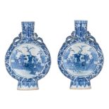 A pair of Chinese blue and white moonflasks, the neck paired with crawling chilongs, 19thC