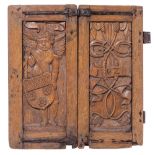 A two-part 16thC oak cupboard folding door dated 1525, 62,5 x 59 cm