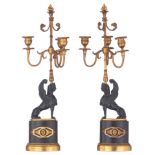 A pair of Empire style sphinx-shaped candelabras, H 52 cm