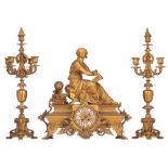 A Napoleon III gilt bronze mantle clock with a pair of matching candelabras, H 50 - 61,5 cm