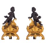 A pair of Baroque style andiron fronts with putti, marked Bouchon, H 39 cm