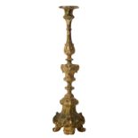 A large gilded wood Baroque altar candlestick, 18thC, H 118 cm