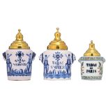A collection of three earthenware tobacco jars with brass covers, H 32 - 42,5 cm