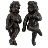 A pair of carved wooden putti, H 70 cm