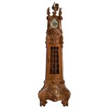 An imposing and richly carved eclectic longcase clock, dated 1931, H 286 - W 84 cm