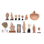 A collection of ancient sculpture fragments, stone and terracotta, 3rdC BC - 3rdC AD, 6,5 - 21,5 cm