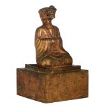 An oriental gilt-bronze figure of a Buddhist disciple on a base, total H 21 cm