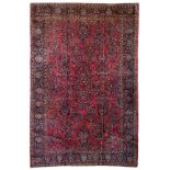 A large Oriental Sarouk rug, decorated with floral motifs, wool, 310 x 468 cm