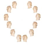 A rare series of twelve ivory profile portraits of Roman emperors, late 18thC / early 19thC, H 7,2 -