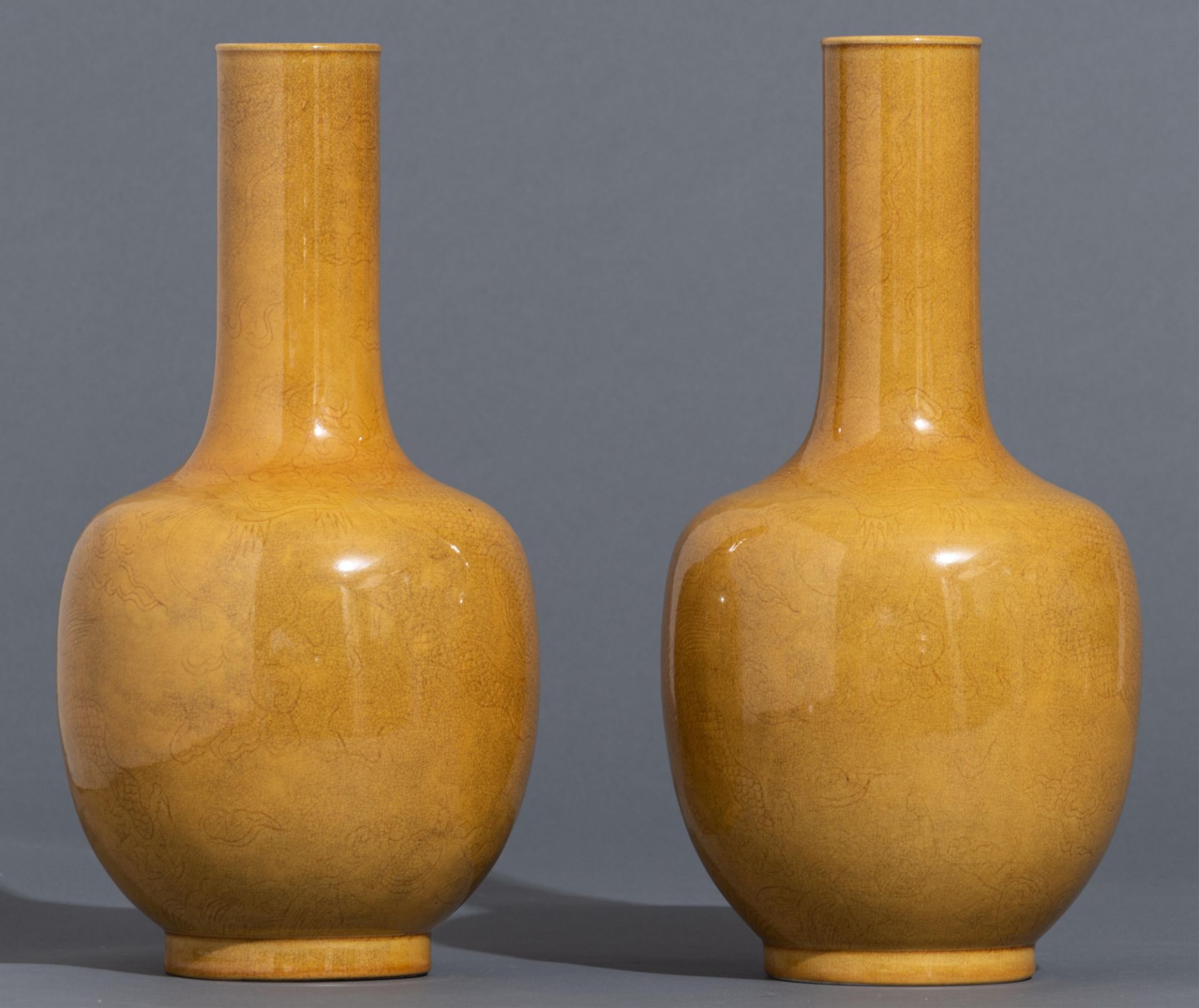 A pair of Chinese incised yellow-glazed 'Dragon' bottle vases, H 33,5 cm - Image 11 of 11