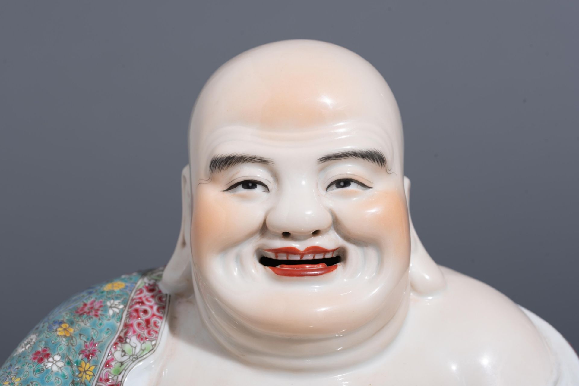 A Chinese famille rose smiling Budai, impressed seal mark, Republic period, H 21,5 cm - Image 7 of 7