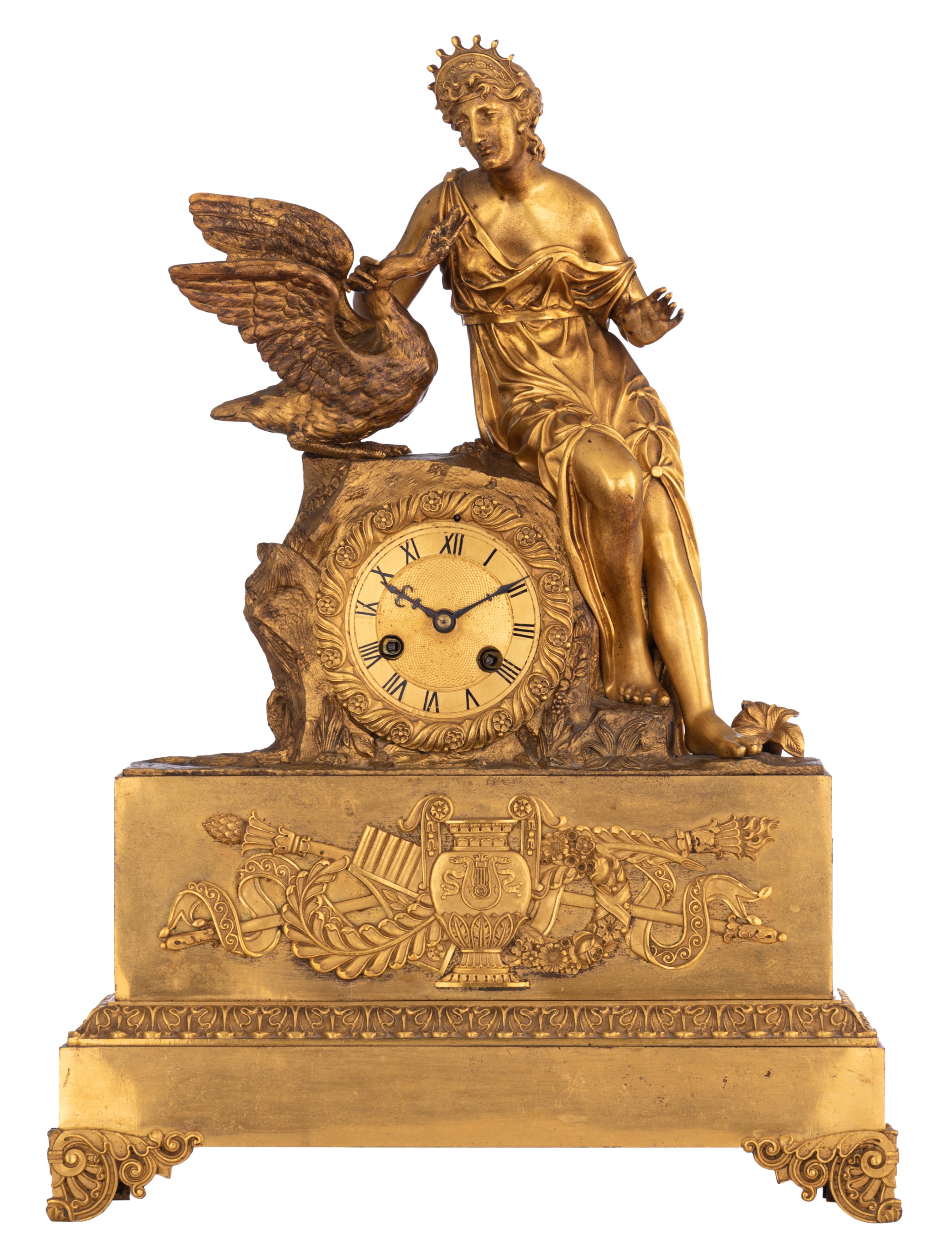 A Restauration style mantle clock, with on top Leda and the swan, H 49 - W 35,5 cm