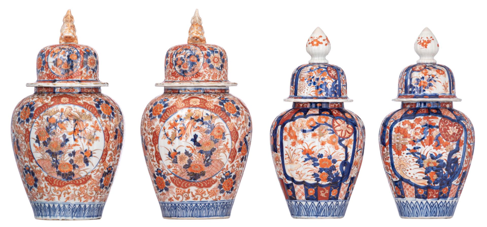 Two pairs of Japanese Imari covered jars and a Japanese Arita Imari serving plate, 19thC, H tallest