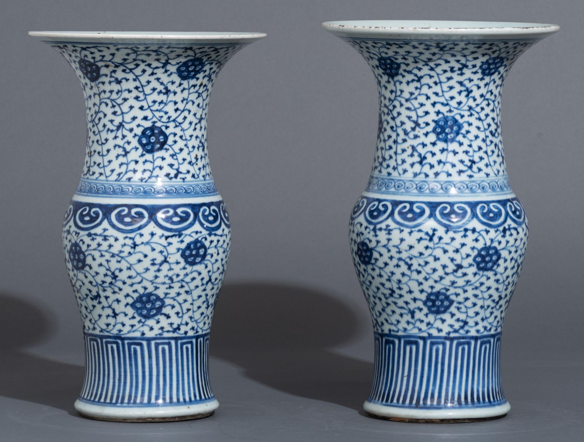 A pair of Chinese blue and white 'scrolling lotus' yenyen vases, 19thC, H 40 cm - Image 3 of 5