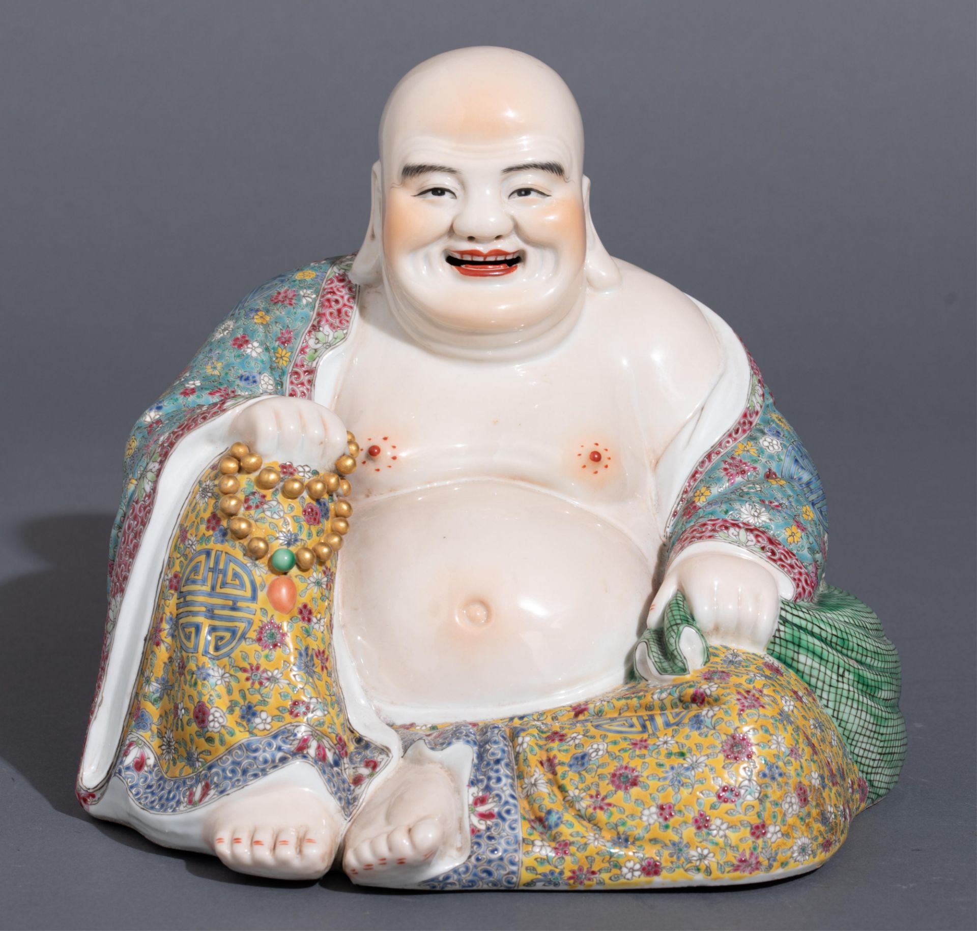 A Chinese famille rose smiling Budai, impressed seal mark, Republic period, H 21,5 cm - Image 2 of 7