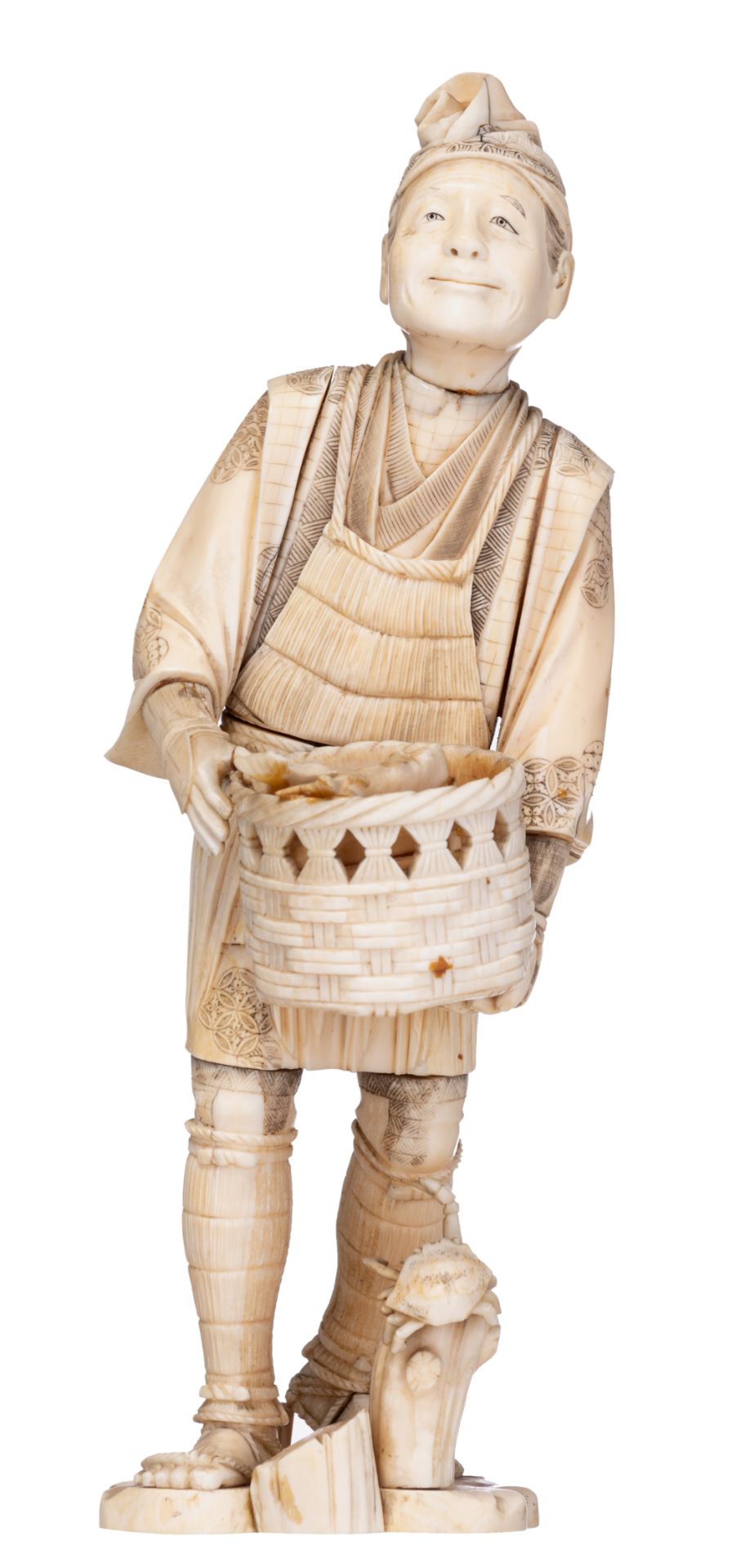 A Japanese Meiji-period ivory okimono, H 30,7 cm - weight c. 1.125 g.