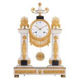 An Empire style column pendule, H 49 - W 34,5 cm