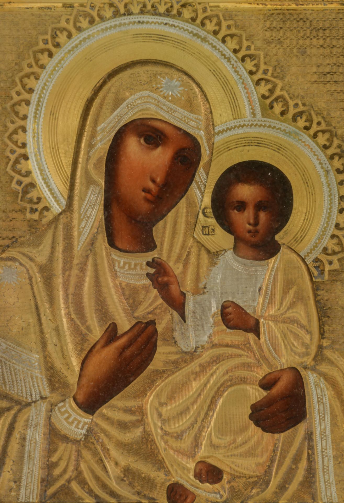 An Eastern European travel icon, depicting the Holy Mother and Child, with silver Reza, 25 x 38 cm - Image 5 of 7
