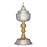 A silver ciborium, on a gilt copper base, 800/000, H 40 cm