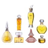 A various collection of factice perfume bottles H 16,5 - 49 cm