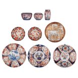 A collection of Japanese Imari chargers and vases, and a Kutani charger, ø 30 - 46 cm