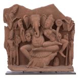A red sandstone figure of seated Ganesha, India, probably 11th-13thC, H 45,5 - W 45 cm